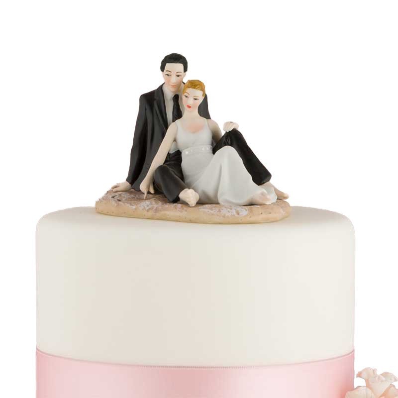 Figurine Couple romantique assis sur le sable