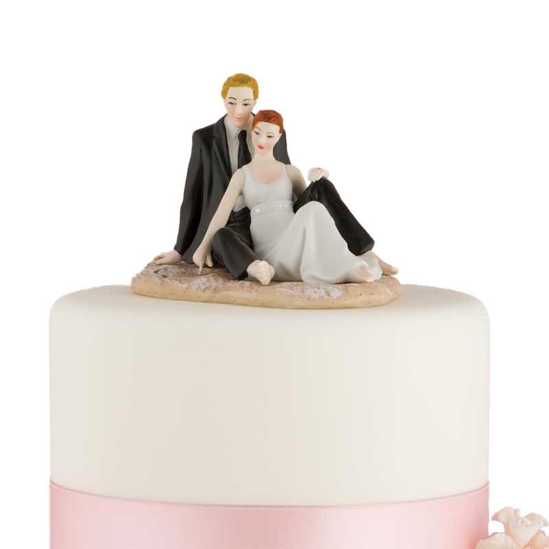 Figurine Couple romantique assis sur le sable