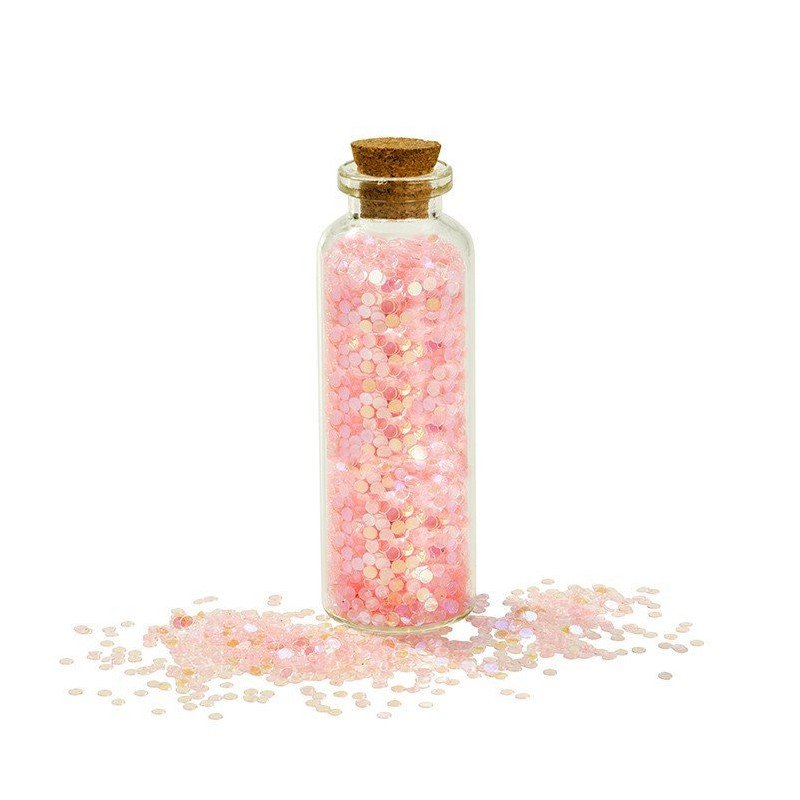 Tube de paillettes roses irisées 